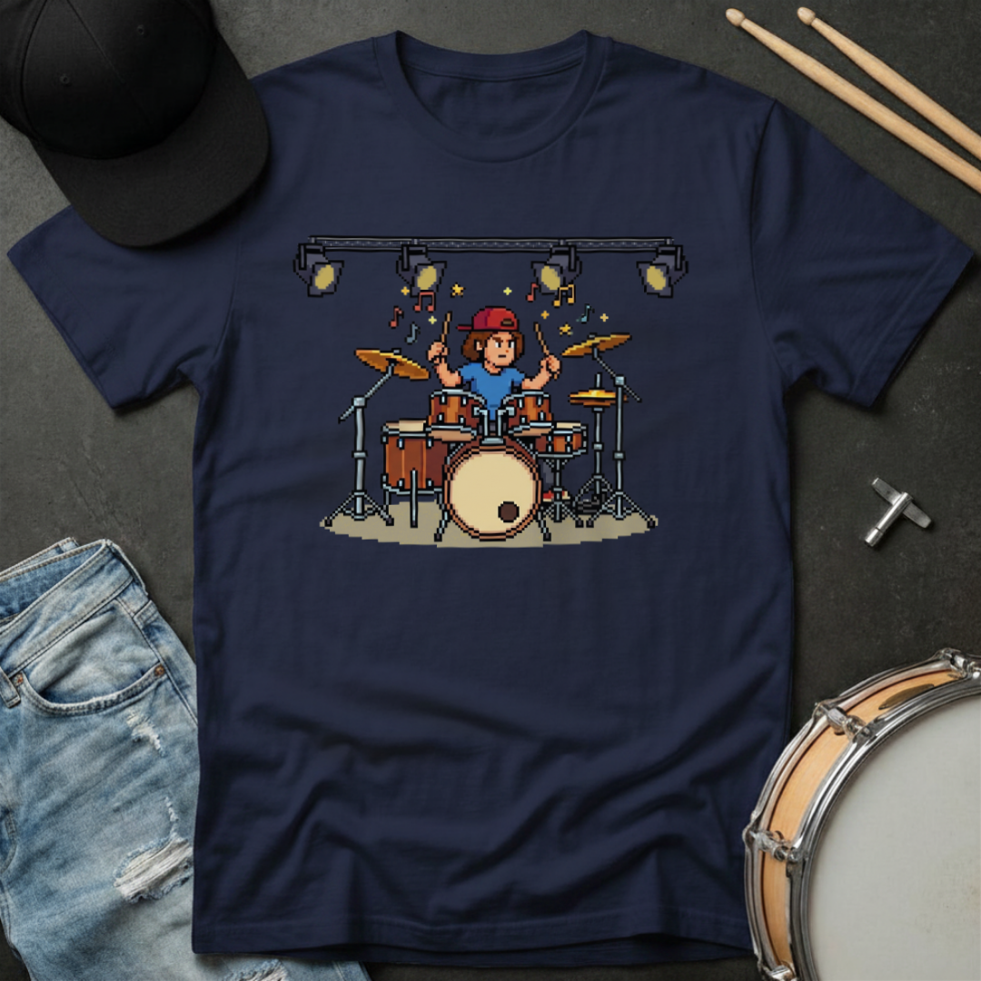 Navy blue t-shirt with a graphic of a drummer on a dark surface with drumsticks and jeans.