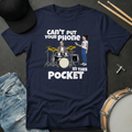 Navy blue t-shirt with graphic design and text on a dark surface with accessories.