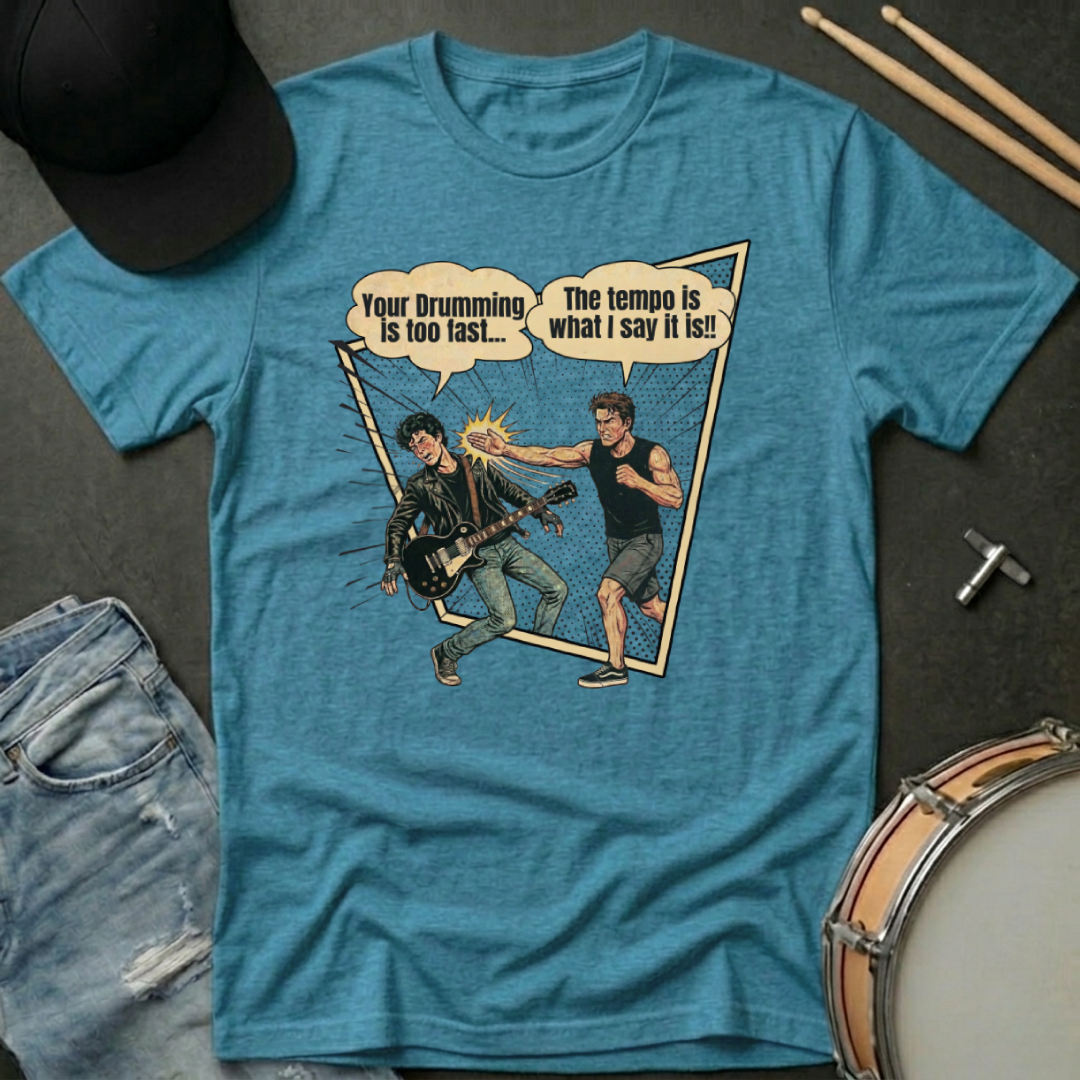 Blue t-shirt with graphic design of two musicians and drumsticks on a dark surface